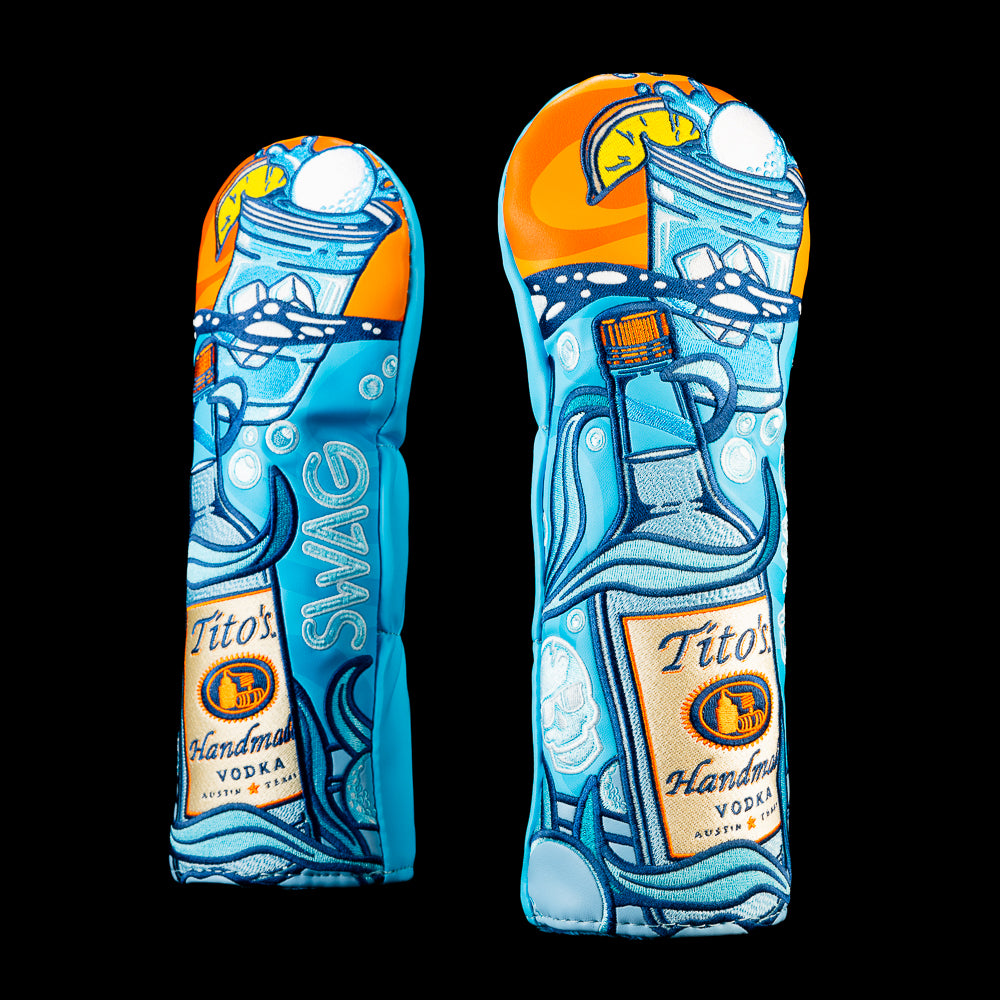 SWAG Golf Tito's Water Hazard driver cover featuring a Tito's Vodka bottle, swirling blue water, floating ice cubes, and bright orange accents with embroidered cocktails.