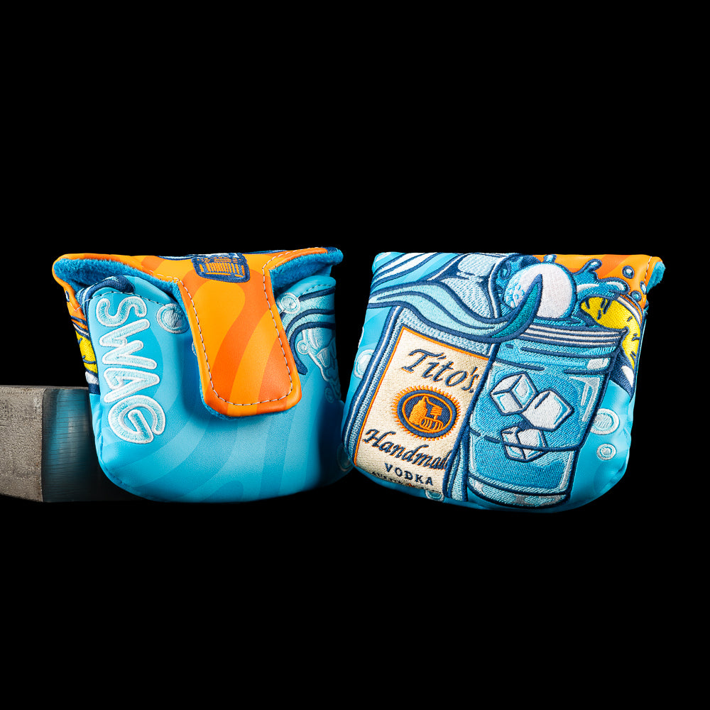 SWAG Golf Tito's Water Hazard mallet putter cover featuring a Tito's Vodka bottle, cocktail with ice cubes, flowing blue water, and bold embroidered splash.
