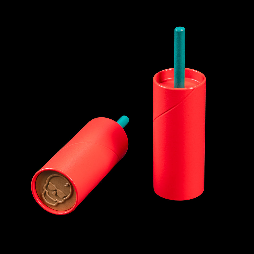 SWAG Golf M-80 ball marker featuring a red firecracker design with fuse detail inspired by classic Fourth of July fireworks.