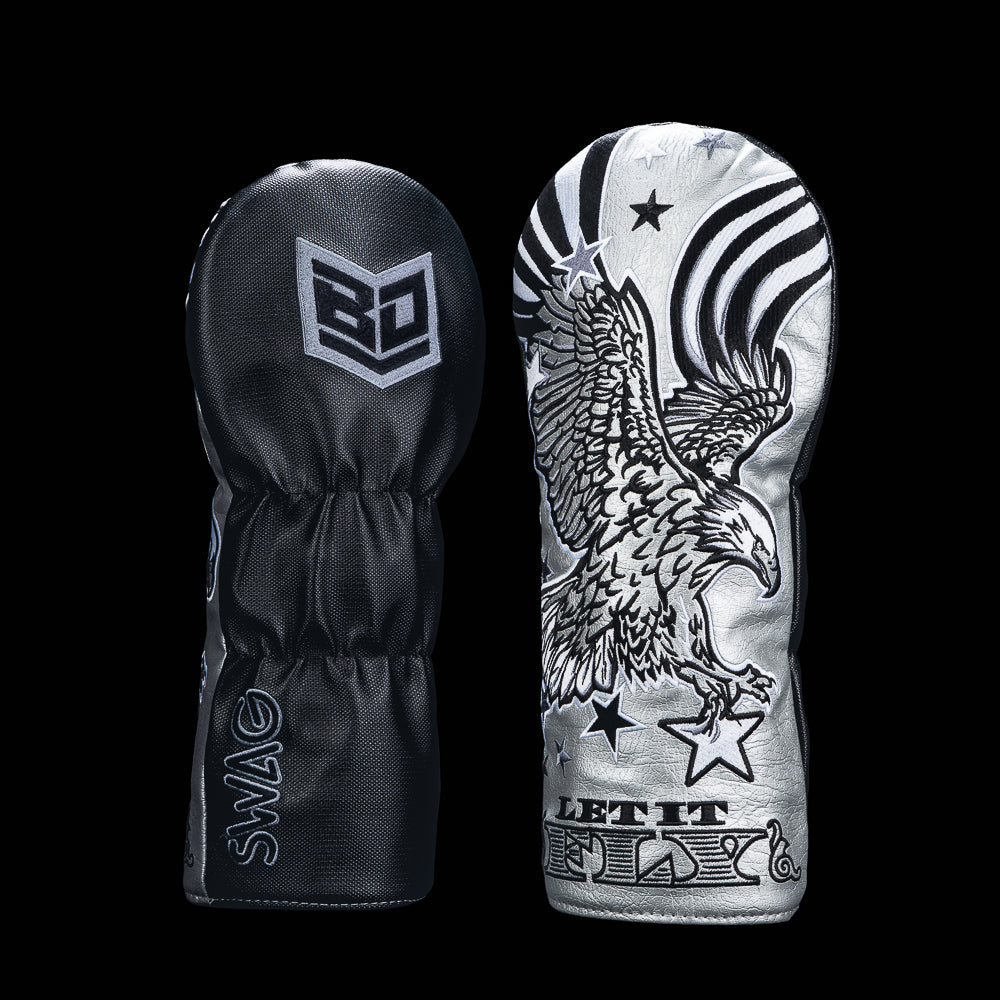 SWAG Golf x Bryson DeChambeau driver golf headcover with a silver and black flying eagle design with Let It Fly text.