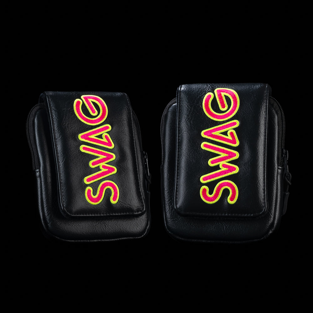 Black SWAG Golf rangefinder case featuring oversized neon pink and yellow SWAG embroidery with premium leather construction.