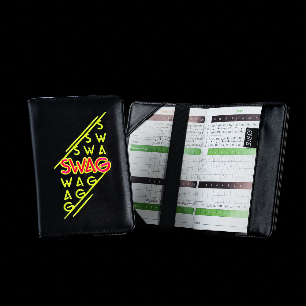 Black SWAG Golf scorecard holder featuring neon pink and yellow stacked SWAG graphics with premium leather construction and interior scorecard storage.