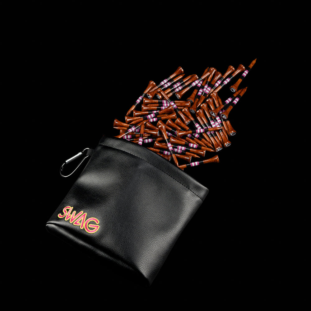 Black SWAG Golf tee pouch with neon pink and yellow SWAG logo embroidery overflowing with brown wooden golf tees.