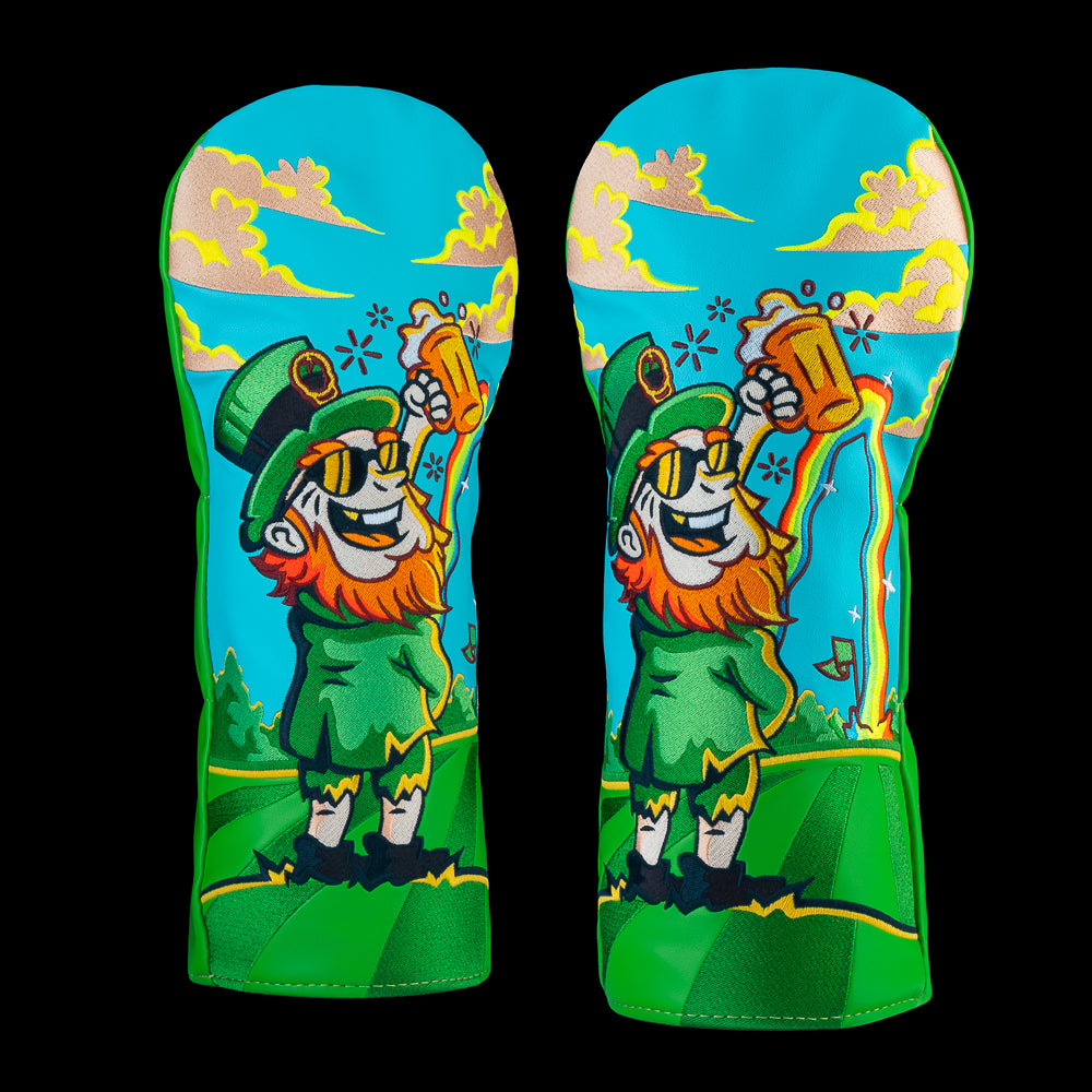 SWAG Golf Follow The Rainbow driver cover with leprechaun with foamy glass pouring a rainbow on a bright green course.