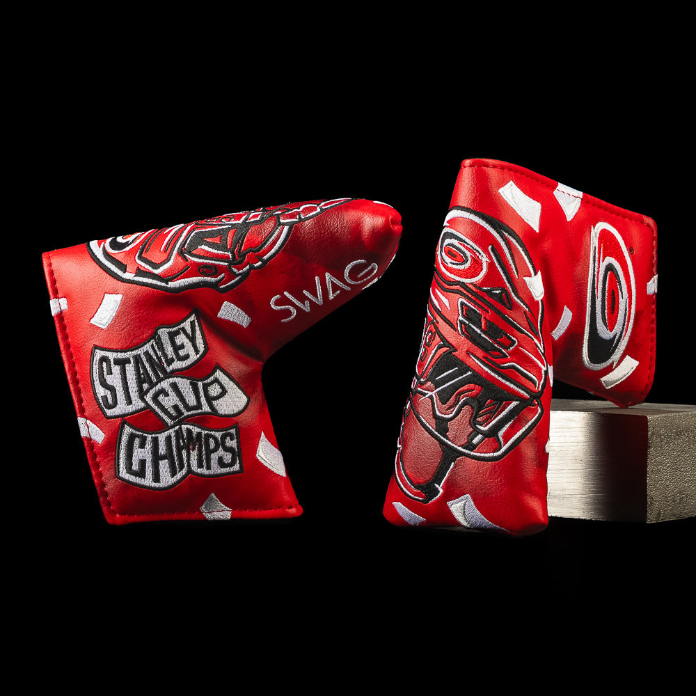 SWAG Golf Red Carolina Hurricanes golf blade headcover with 'Stanley Cup Champs' and 'Swag' text on a black background