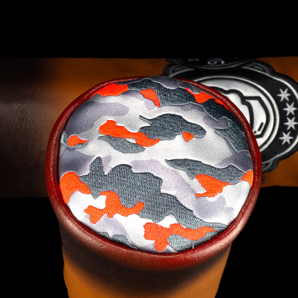 Cigar inspired fairway headcover with smoke fade, skull seal, and SWAG Golf band.