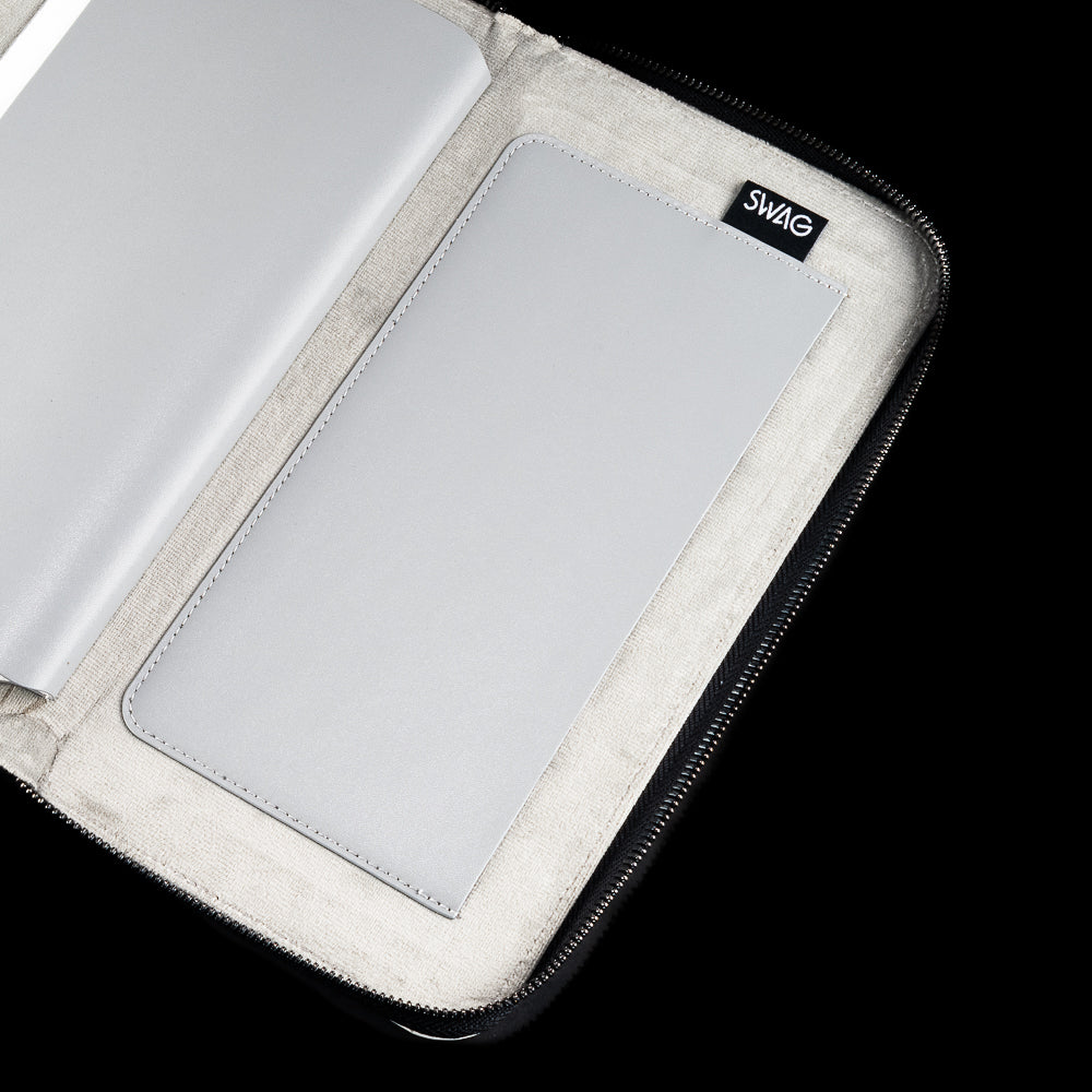 White SWAG Golf glove folio interior featuring oversized storage sleeve with premium suede-lined protective construction.