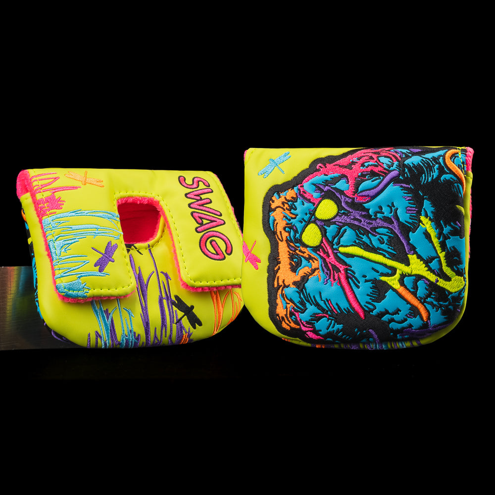 Swag Thing center shaft mallet cover with electric swamp monster design, neon yellow base, and splatter background.