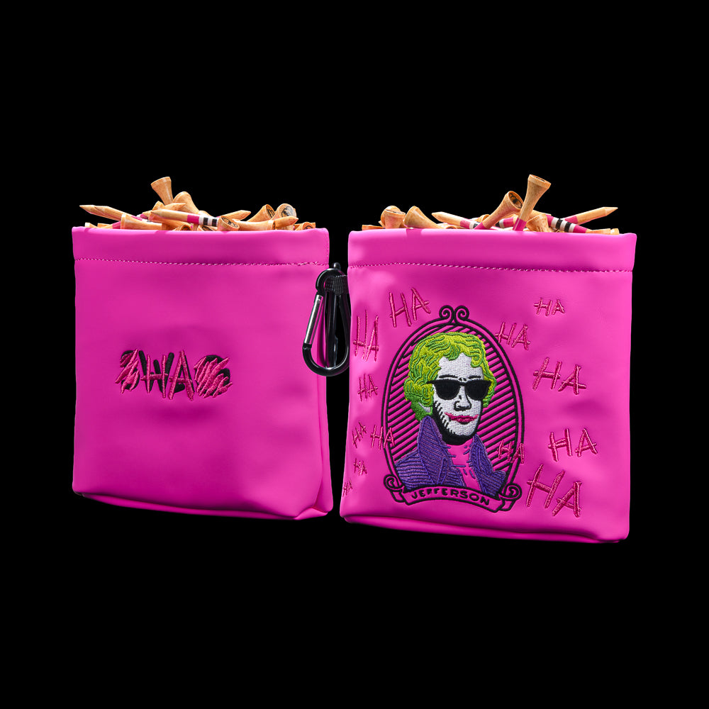 Front and back views of SWAG Golf pink Defaced Jefferson tee pouch with portrait artwork, graffiti, and SWAG logo.