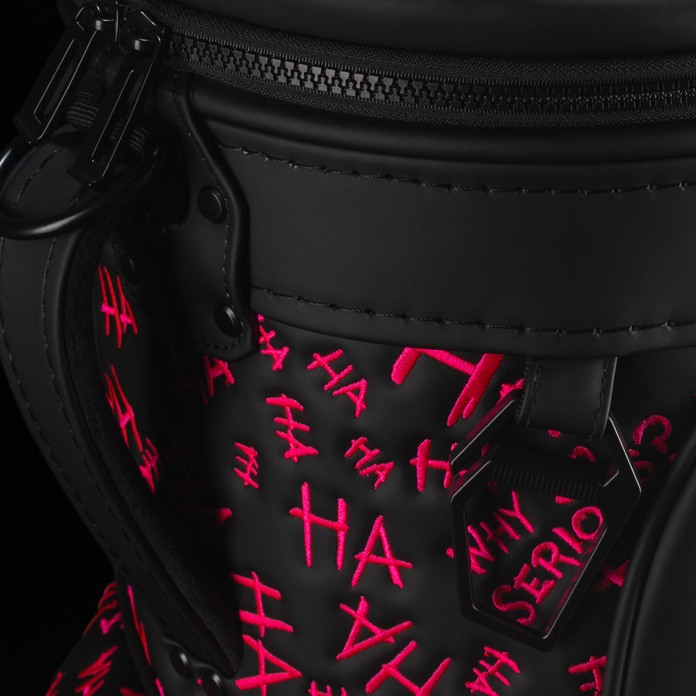 Close-up of Defaced Dollar Bills Den Caddy Cooler showing zipper, black carry strap, and pink graffiti.