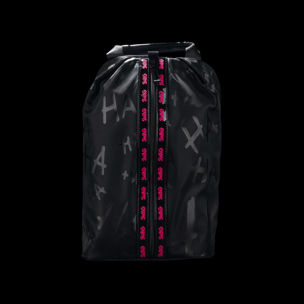 SWAG Golf black Defaced shoe bag with tonal graffiti, a top handle, and pink SWAG lettering along the front zipper.