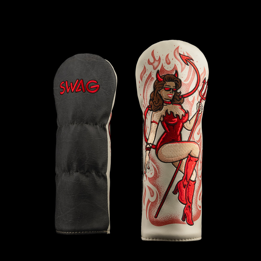 SWAG Golf Devil Pin Up fairway cover with a red devil woman, pitchfork, and flames on cream, plus a black reverse with red SWAG lettering.