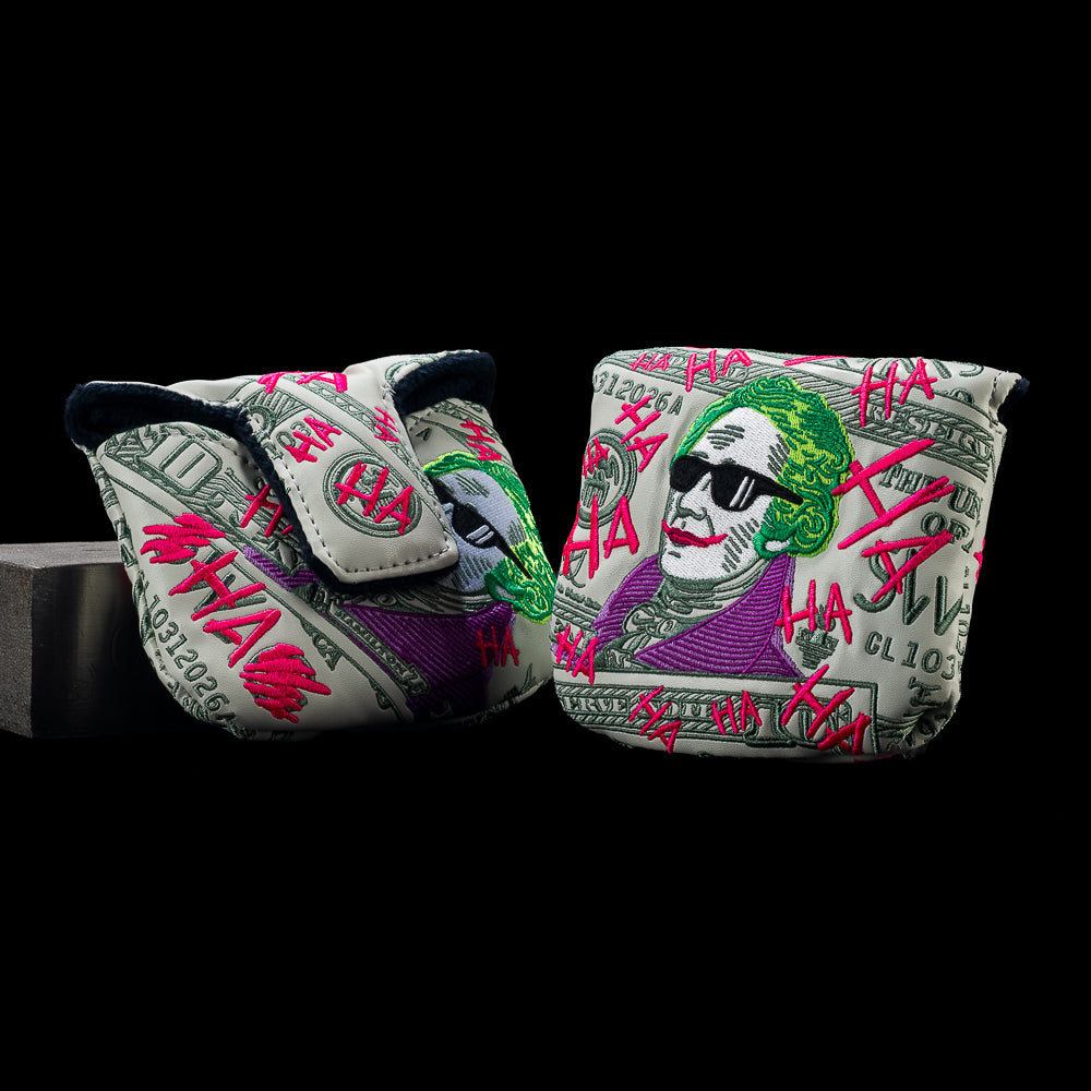 Front and back views of SWAG Golf Defaced Hamilton mallet headcover with pale-green bill art, green-haired portrait, and pink graffiti.