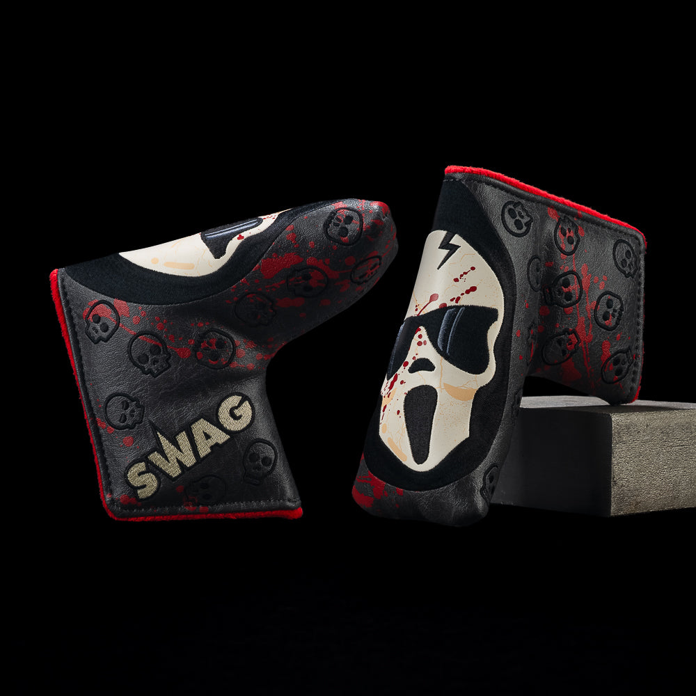 Two views of the black SWAG Golf Screamer Skull blade cover with a white elongated skull face, sunglasses, red splatter, and red trim.