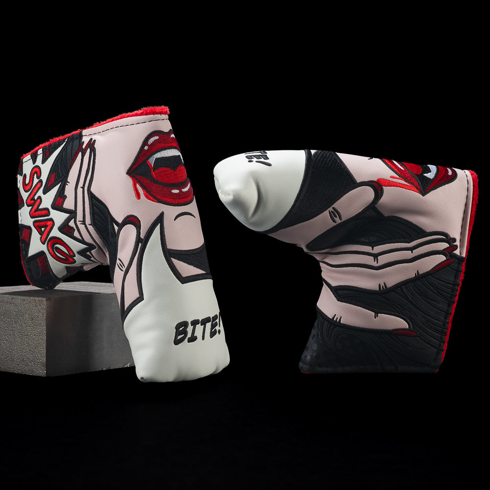 Two views of the SWAG Golf Vampire Swagatha blade cover with comic-style red lips, white fangs, illustrated hands, and red trim.