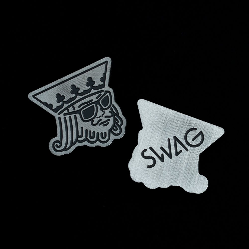 SWAG Golf King stainless steel polished Cerakote ball marker with black paint fill.