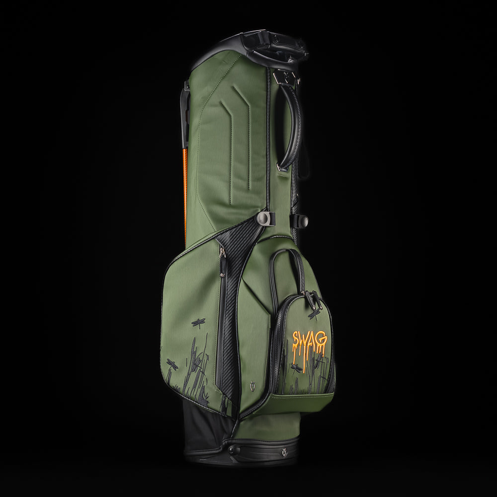 SWAG Golf SWAG Thing green and black Vessel stand golf bag with yellow text on a black background
