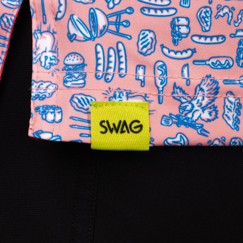 SWAG Golf Backyard BBQ Classic Polo hem detail with signature SWAG woven tag and all-over backyard barbecue print