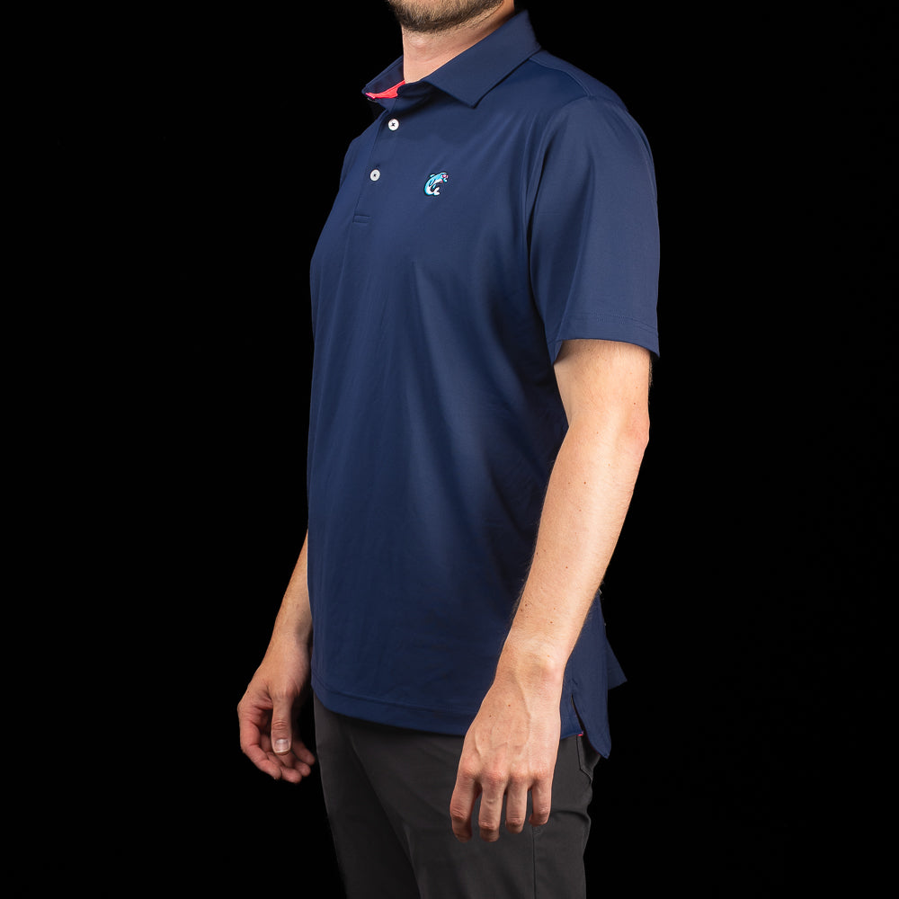Side profile of SWAG Golf Navy Flipper Classic Polo men's navy performance golf polo shirt