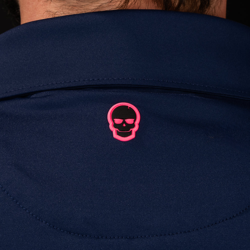 SWAG Golf Navy Flipper Classic Polo back collar detail featuring embroidered skull logo on navy performance fabric