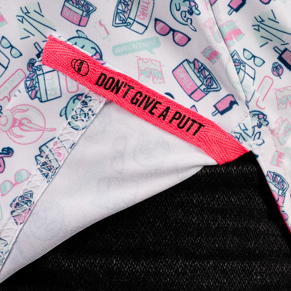 SWAG Golf pool party themed men's short sleeve classic golf polo with a micro print featuring flamingoes, coolers, popsicles and more.