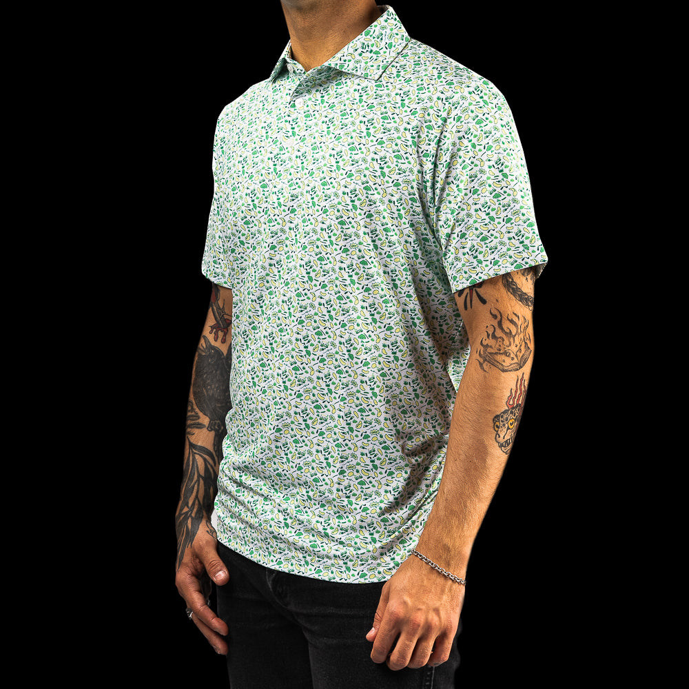 SWAG Golf men's short sleeve classic golf polo shirt with an allover green and yellow sand pits micro print design.
