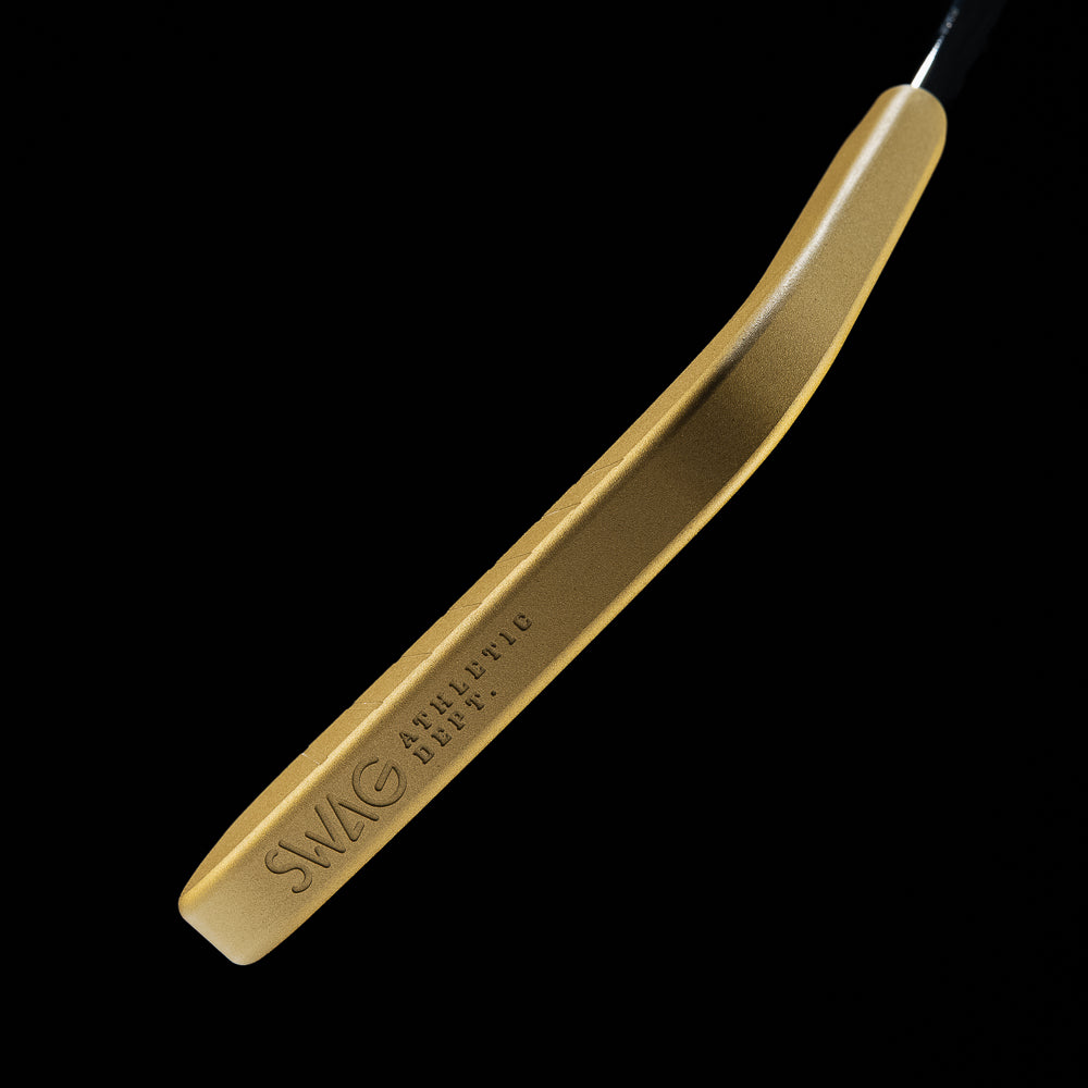 Gold SWAG X NHL putter sole with logos.