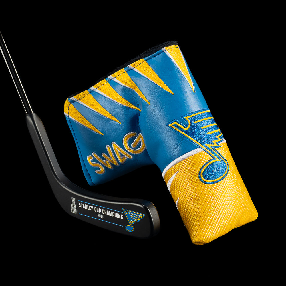 SWAG Golf X St. Louis Blues Hockey Blade Putter head engraved Stanley Cup Champions 2019 with blue and gold jersey blade cover.