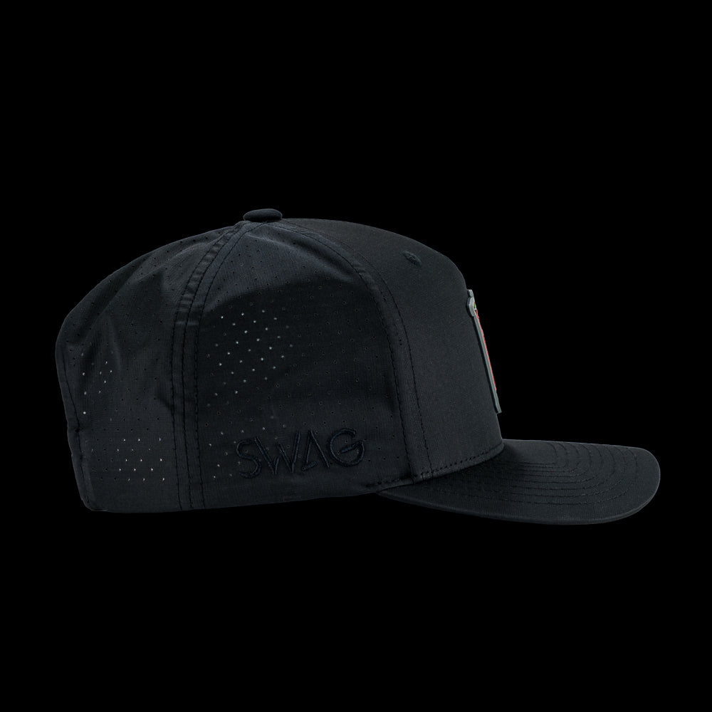 Black performance golf hat with a colorful bourbon glass skull graphic rubber patch on a black background