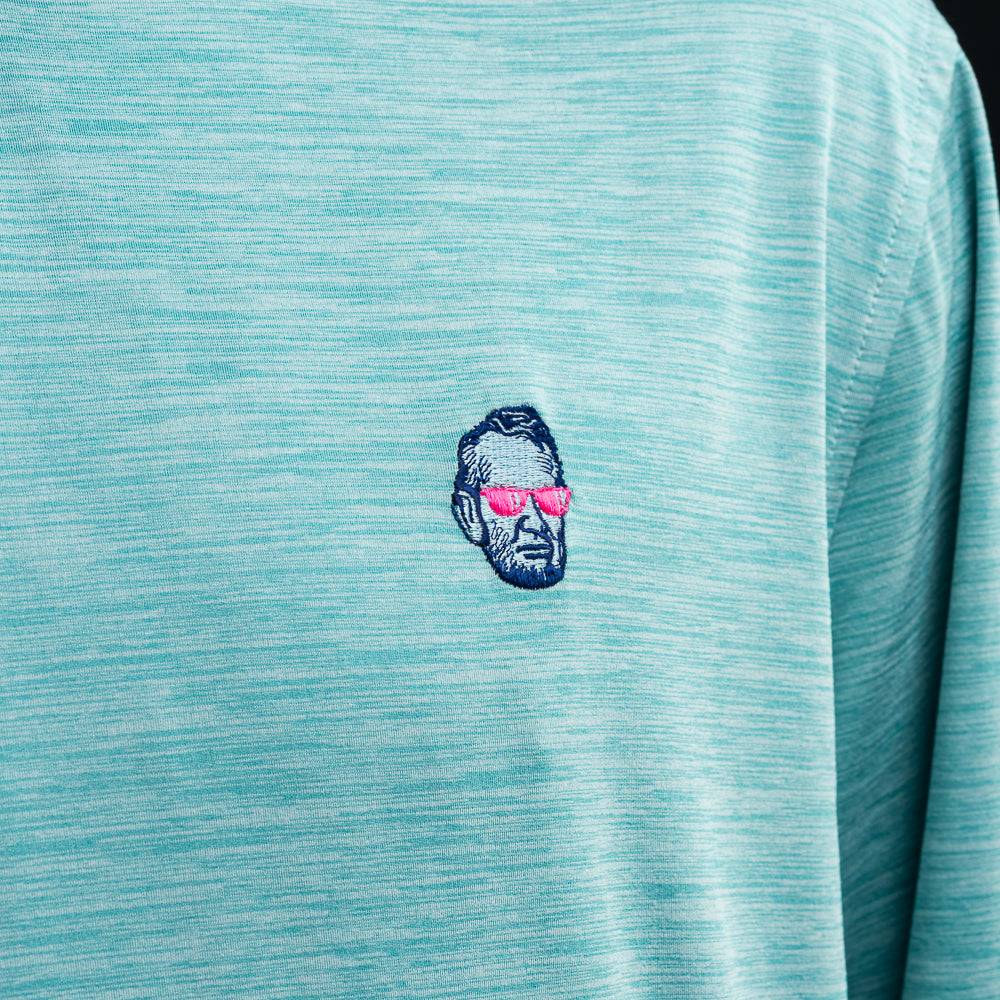 SWAG x Johnnie-O Lincoln Talon Featherweight green performance long sleeve golf hoodie.