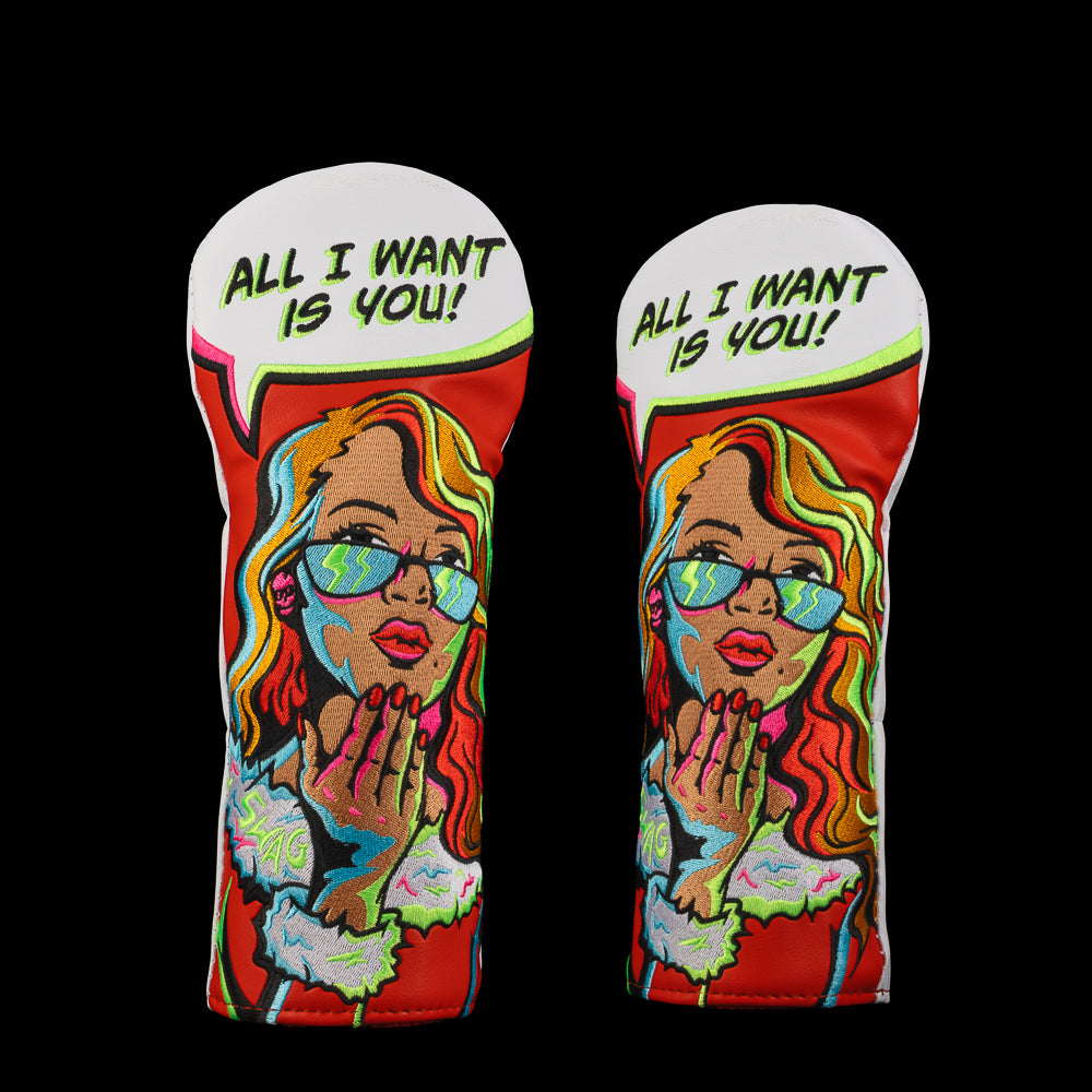 Red and Green-haired pop-art woman in red holiday outfit saying “All I Want Is You!” on bright red cover.