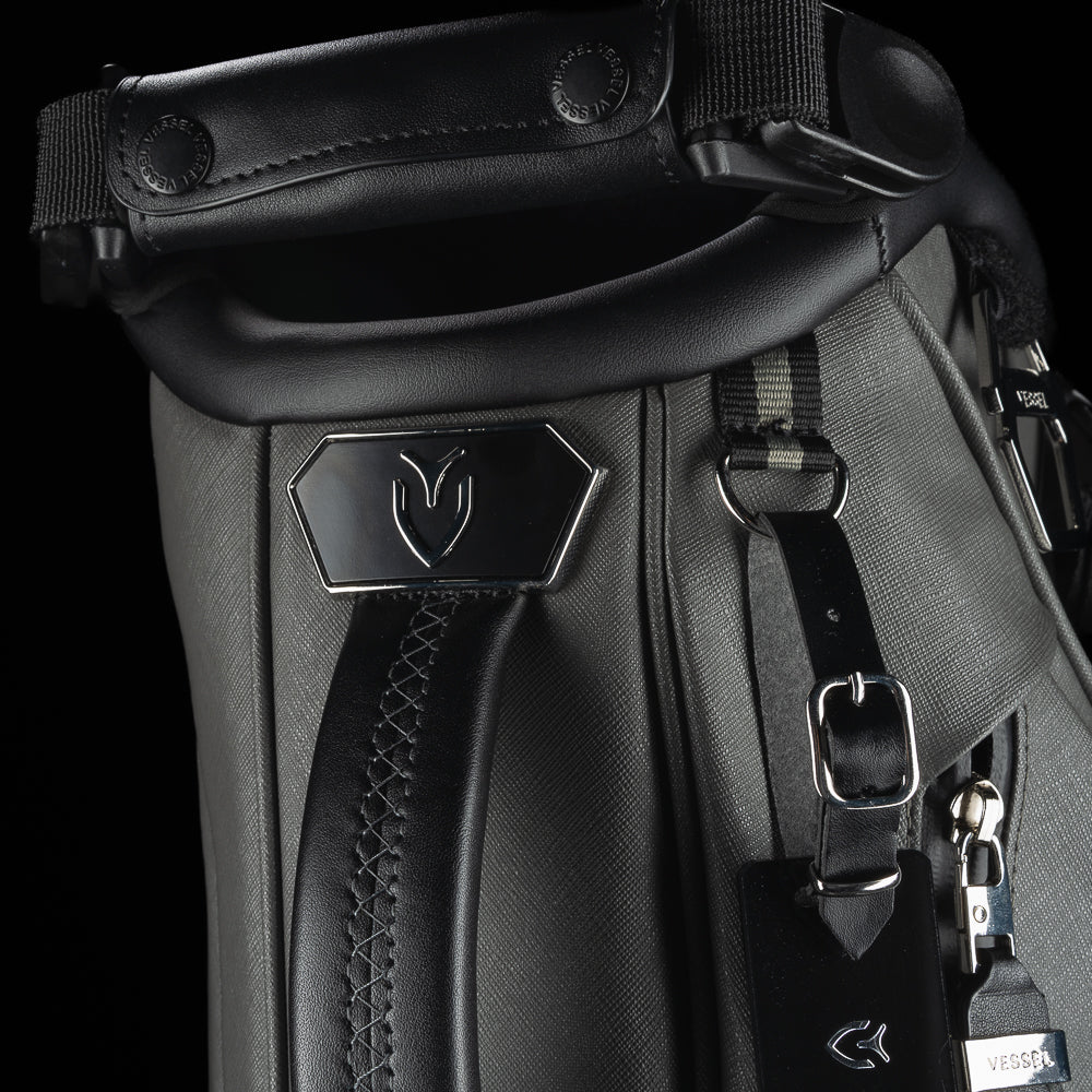 SWAG x Vessel VLS Lux grey golf stand bag with a Defaced Joker embroidered ball pocket panel.