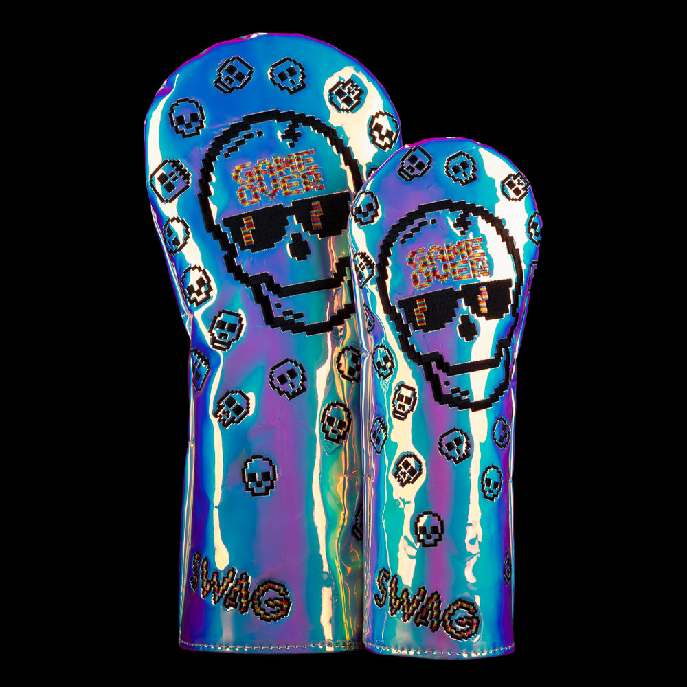 Pearlescent driver and fairway covers with pixel skull graphic, mini icons, and SWAG branding in a soft rainbow gradient. Featuring "GAME OVER" pixelated quote.