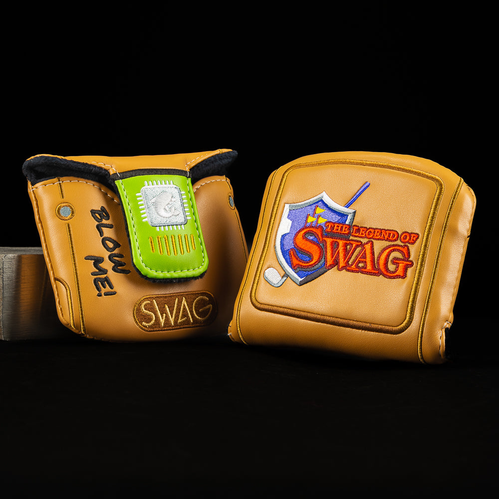 Gold retro cartridge-style mallet cover with Ocarina of SWAG fantasy artwork and SWAG branding.