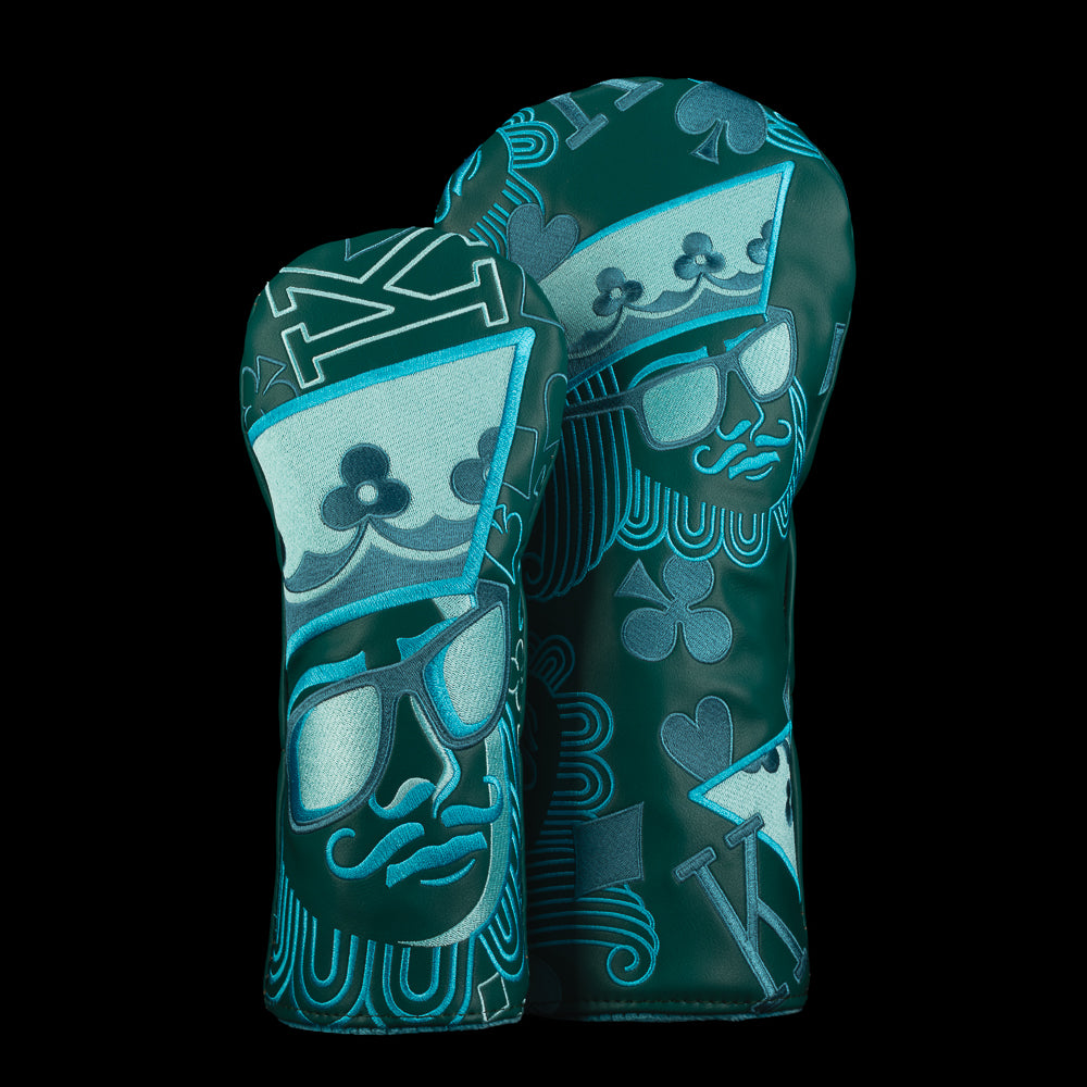 Mint, emerald green, and powder blue matching driver and fairway covers with king artwork, suit symbols, and SWAG logos.