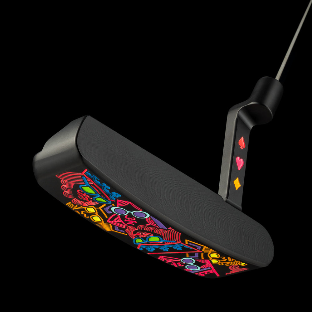 SWAG Golf Sherbet stacked royalty black cerakote finish limited edition right handed golf putter with handpainted neon orange, purple, red, and orange accents. Includes a headcover.