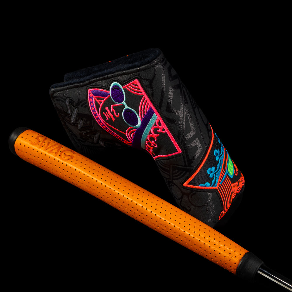 SWAG Golf Sherbet stacked royalty black cerakote finish limited edition right handed golf putter with handpainted neon orange, purple, red, and orange accents. Includes a headcover.