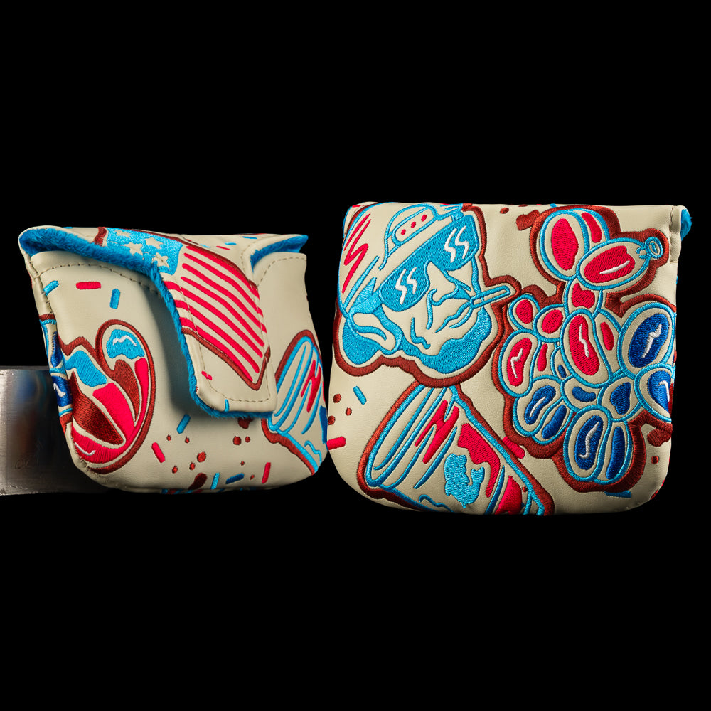 Holiday cookie-themed SWAG Golf mallet headcover with red, blue, and teal icing designs.