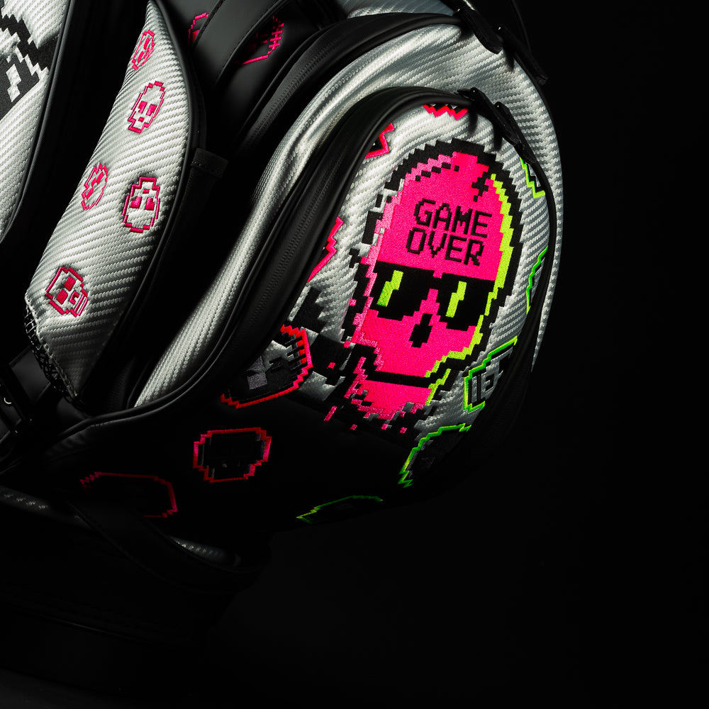 SWAG Golf Game Over silver, black, and neon pink golf staff bag accessory.