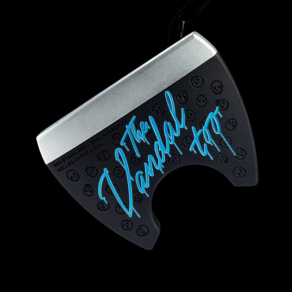 SWAG Golf The Vandal Too fang style MOI golf putter made from 303 stainless steel and 6061 aluminum with electric blue "The Vandal too" text on the sole.