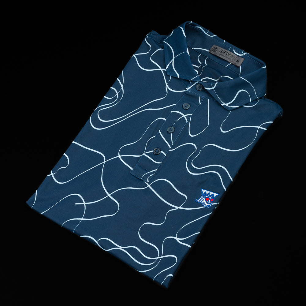 Navy Blue golf polo with light blue wave design and king logo on left chest.