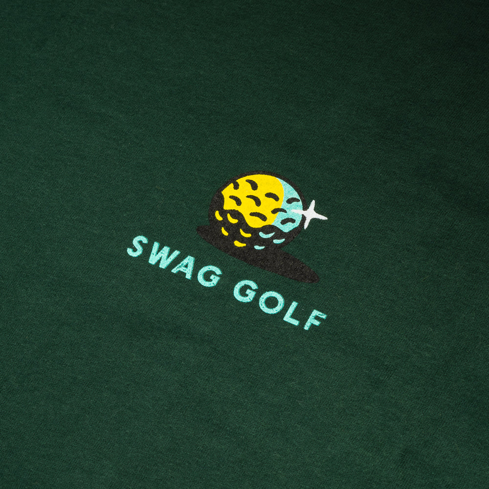 Green Bad Dog Club green t-shirt with yellow golf ball and teal SWAG golf.
