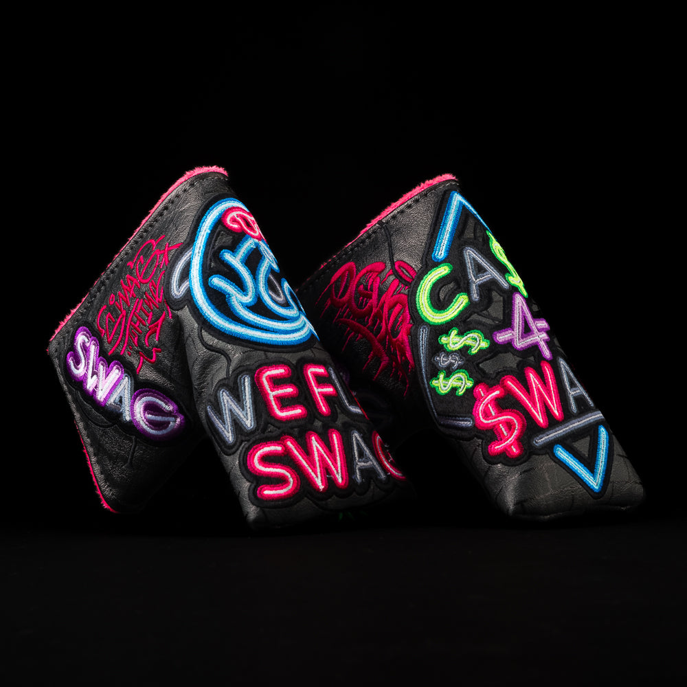 SWAG Pawn Shop putter blade golf headcover in black with grattifi in neon blue, green, purple, pink and black.