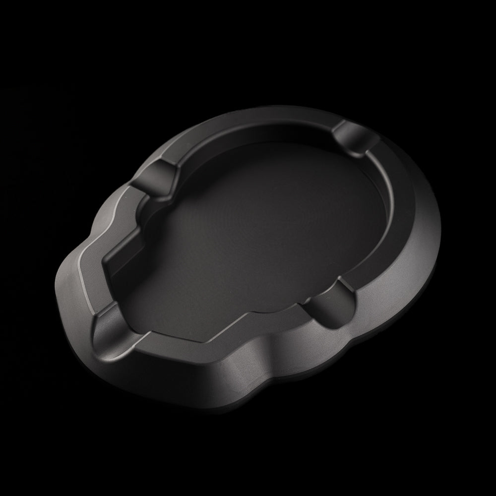 Black aluminum cigar ashtray with SWAG skull outline silhouette.