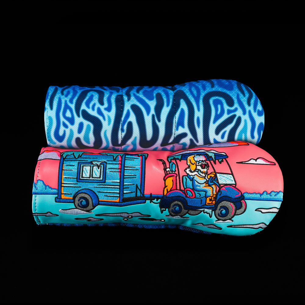 Horizontal view of a colorful fairway golf headcover with ice fishing hole hopper theme, winter scene graphics, and SWAG branding