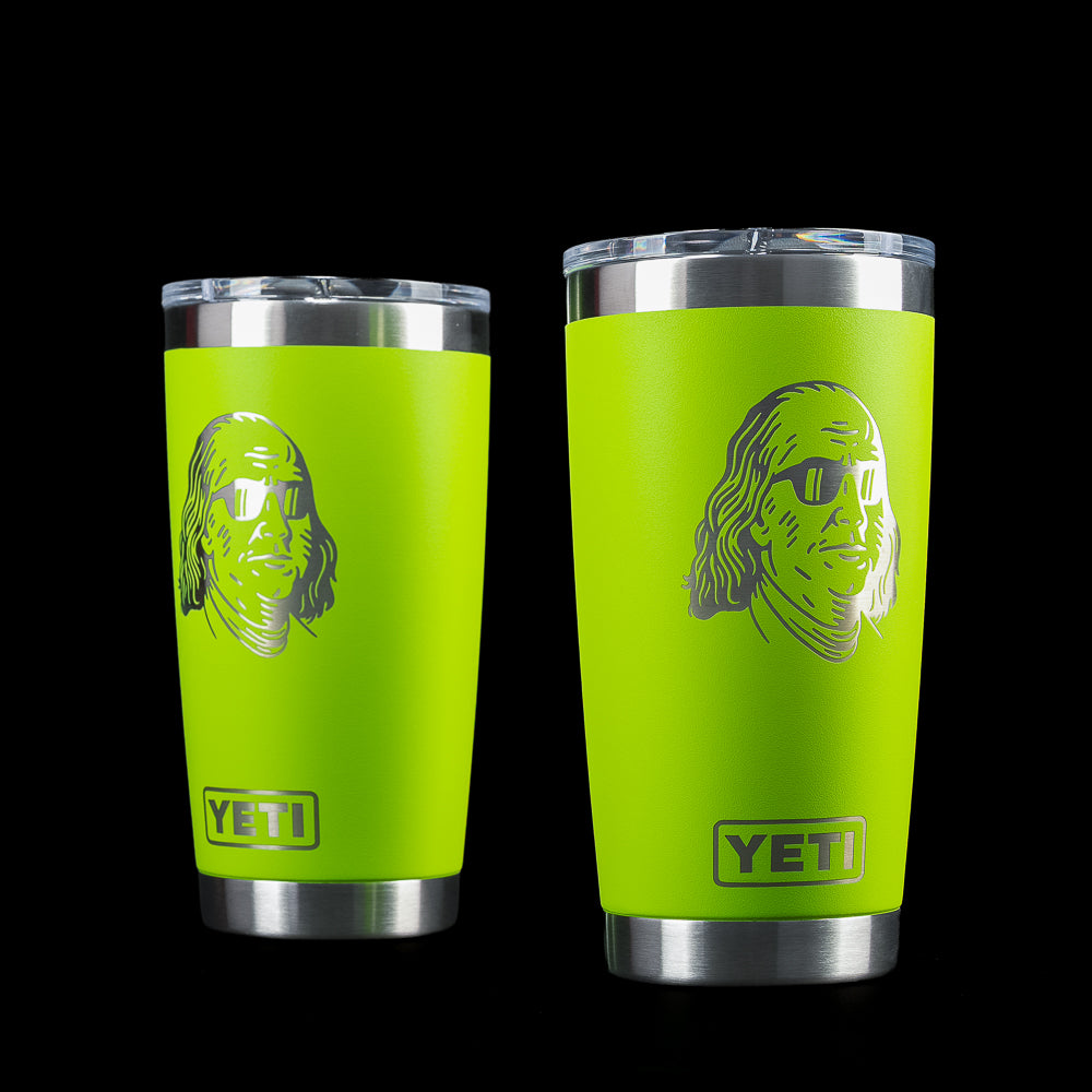 SWAG Golf x YETI Rambler 20 oz tumbler in Venom Green featuring Benjamin Franklin wearing sunglasses on one side and YETI branding at the base.