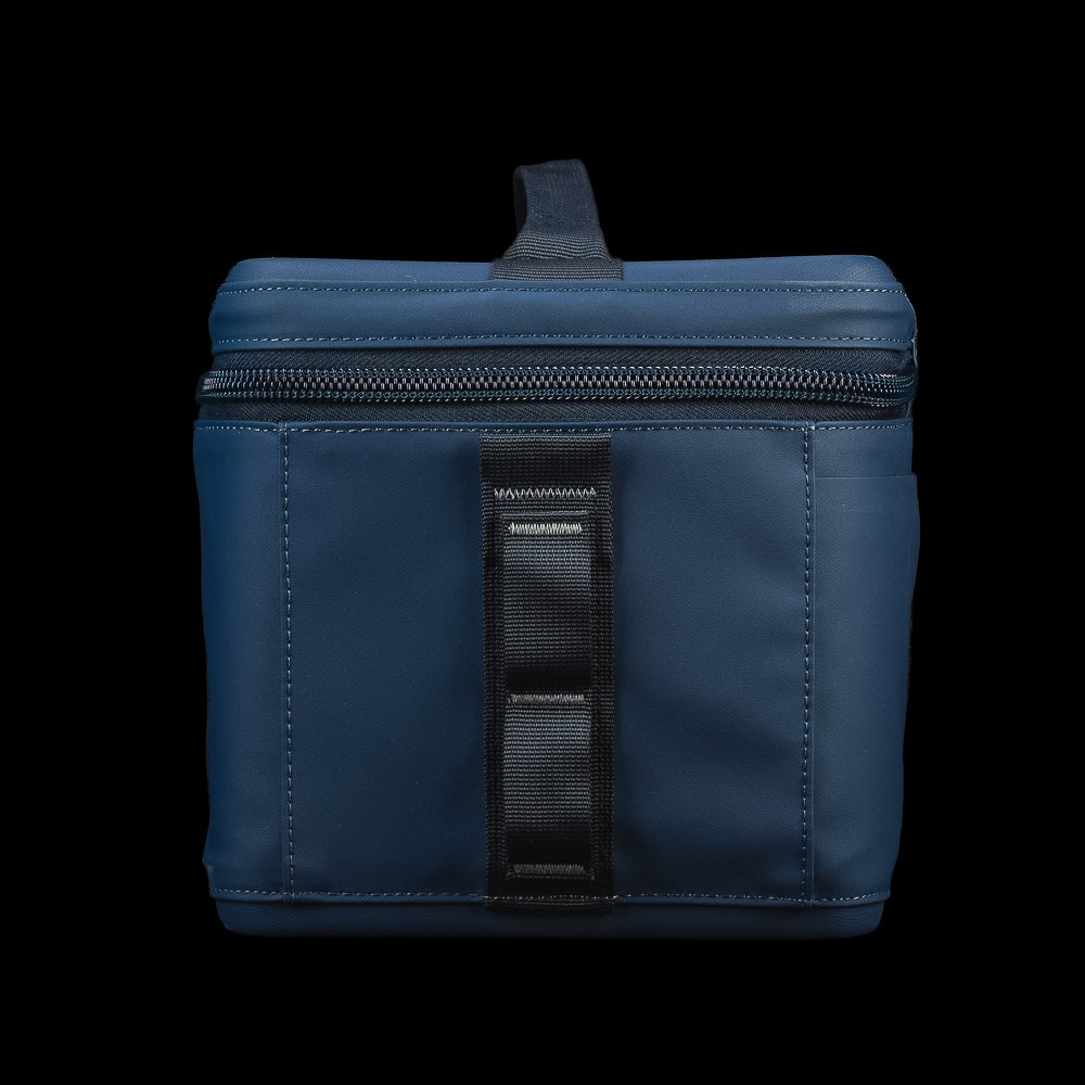 Side profile of the SWAG Golf x YETI Daytrip 9L insulated lunch box highlighting the side attachment loop and durable construction.