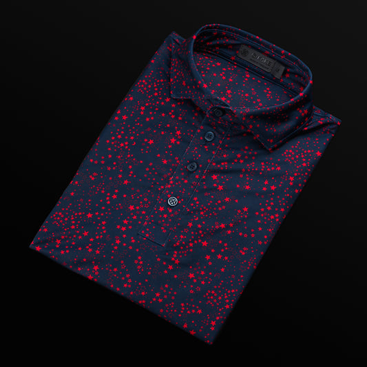 Swag x G/Fore navy men's performance short sleeve golf polo shirt with red stars.