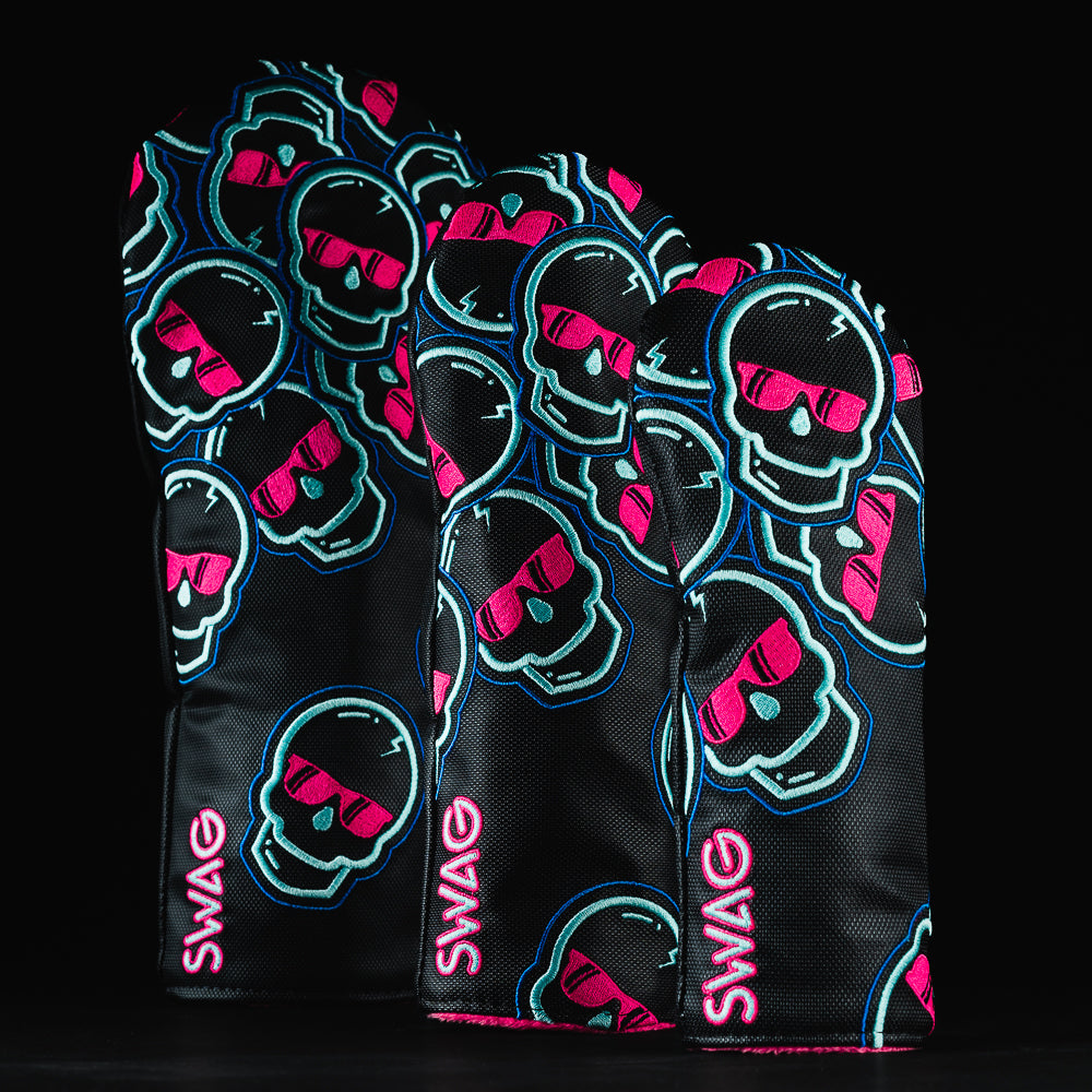Black falling Swag skulls wood golf club cover set of 3 with blue and pink accents.