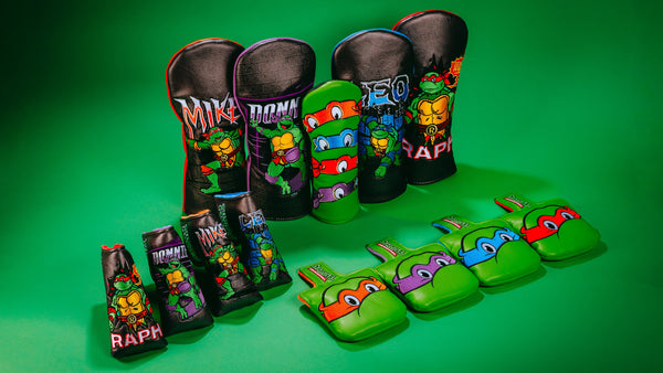 Rewind Golf x TMNT official golf accessories featuring driver, fairway, hybrid, and blade golf headcovers.